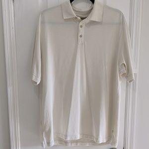 Tommy Bahama short sleeve 1/4button up collared shirt. Color is a creamy ivory